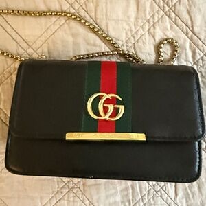 Black small purse with gold chain